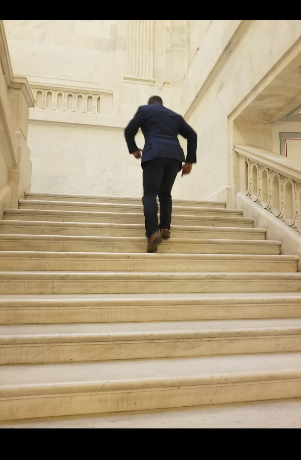 Obie walking up the Senate stairs during his Archer Fellowship experience